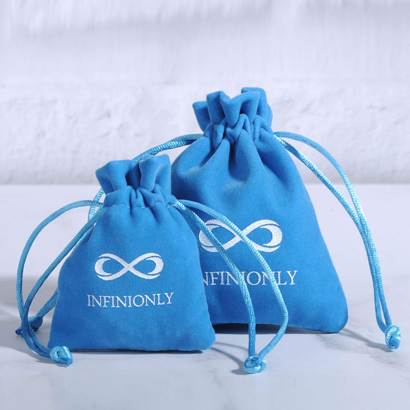 INFINIONLY bracciale infinito argento 925 stella zircone