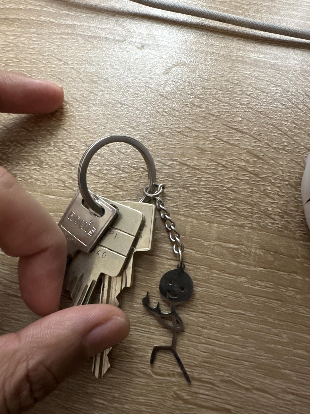 Eueavan Keyrings portachiavi dito medio argento smile