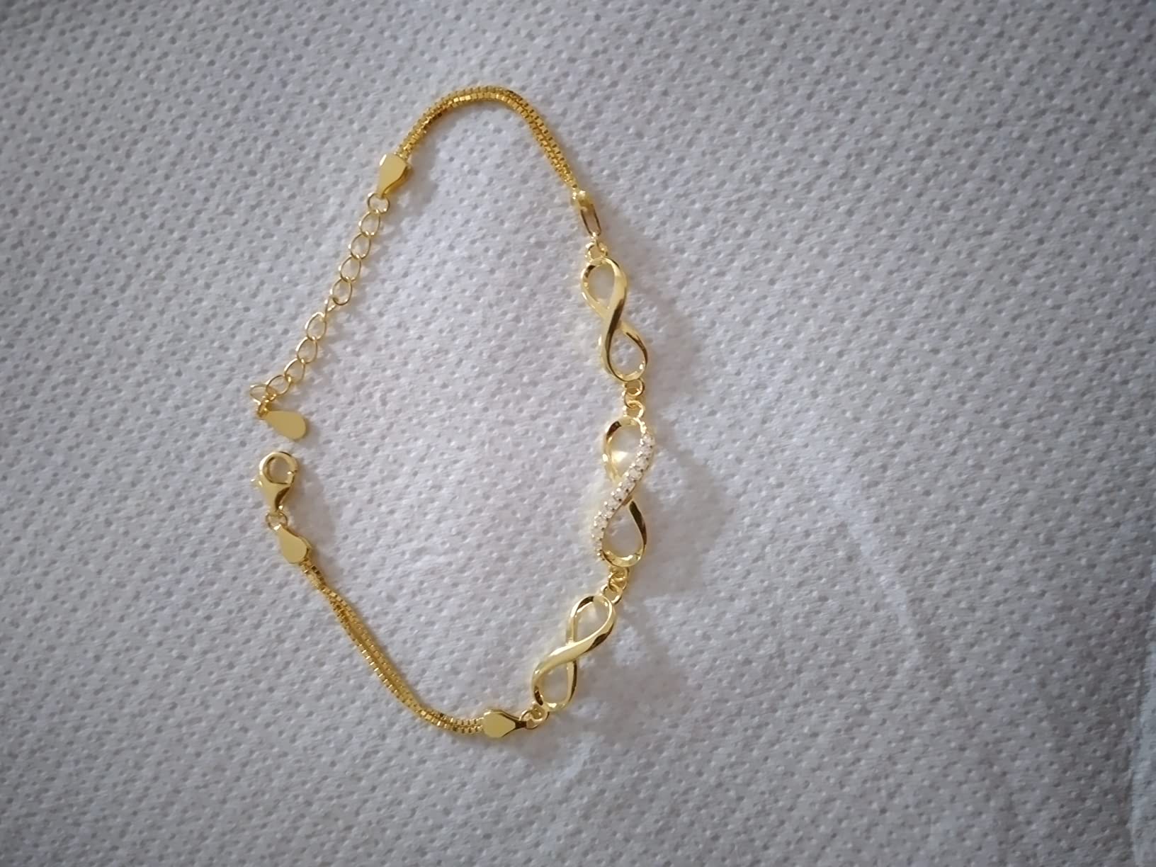 INFINIONLY Infinito bracciale argento zirconi oro