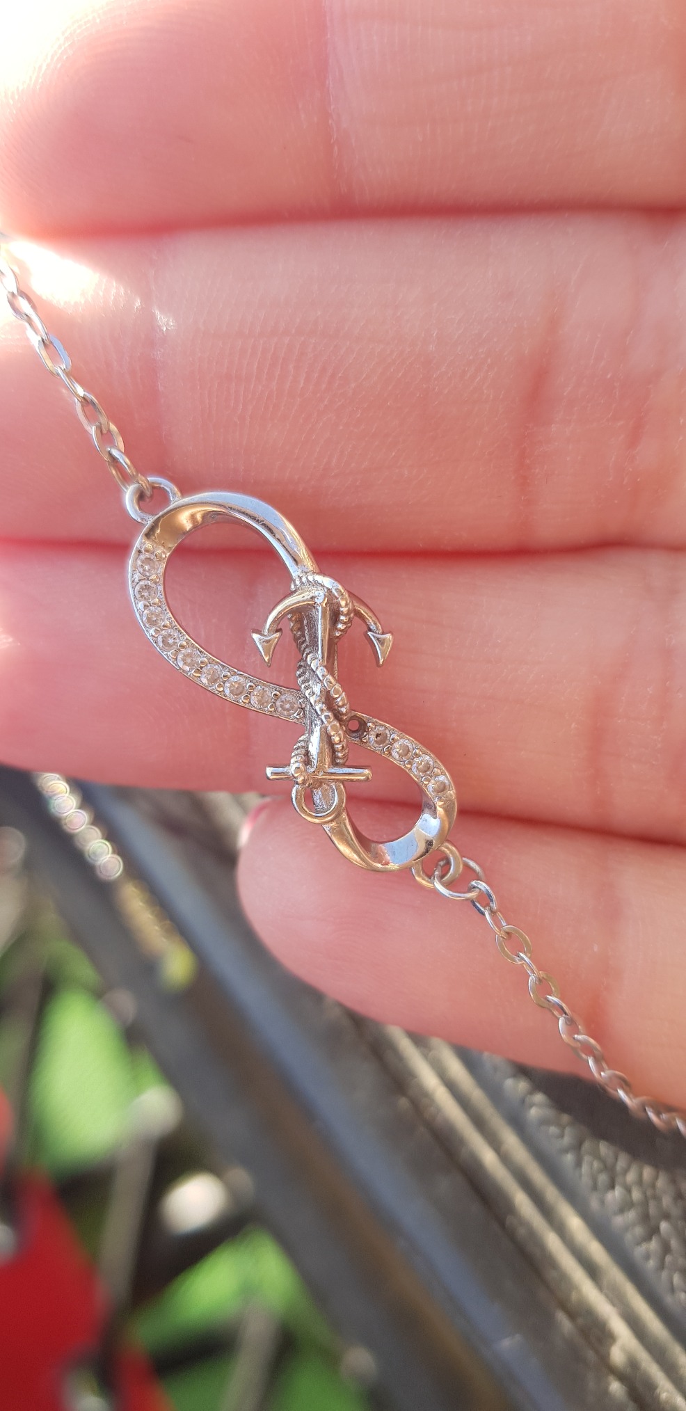 INFINIONLY bracciale infinito argento 925 stella zircone