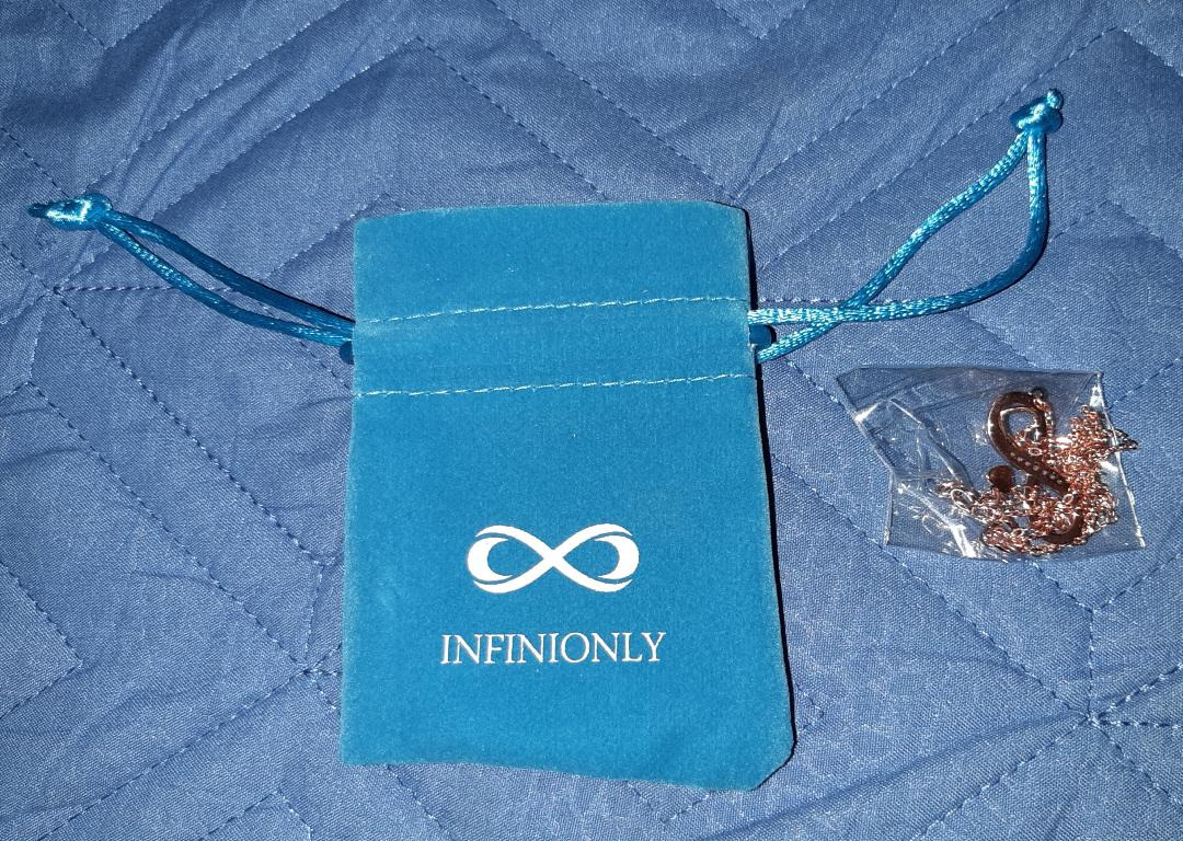 INFINIONLY collana infinito cuore oro rosa zircone